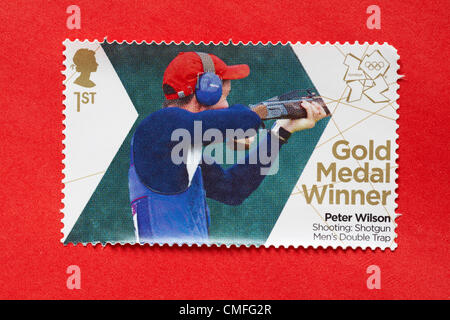 UK Friday 3 August 2012. Stamp to honour gold medal winner Peter Wilson in the Shooting Shotgun Men's Double Trap event. Stamp purchased and stuck on red envelope to send to Olympic supporter. Stock Photo