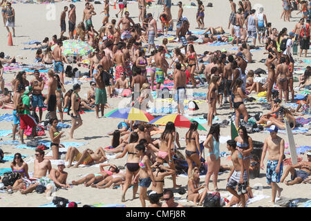 Aug. 3, 2012 - Los Angeles, California (CA, United States - Beach goers crowd at the Huntington Beach during the Nike US Open of Surfing on August 2, 2012, in California. (Credit Image: © Ringo Chiu/ZUMAPRESS.com) Stock Photo