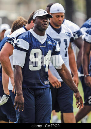 Dallas Cowboys linebacker DeMarcus Ware (94) and defensive end Jason  Hatcher (97) celebrate Ware's second sack of the first half against the New  York Giants in the NFL season opener at MetLife