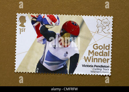 UK Saturday 4 August 2012. Stamp to honour gold medal winner Victoria Pendleton in the Cycling Track Women's Keirin event. Stamp purchased and stuck on gold to send to Olympic supporter. Stock Photo