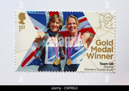 UK Saturday 4 August 2012. Stamp to honour gold medal winner Team GB Rowing Women's Double Sculls event - Katherine Grainger and Anna Watkins. Stamp purchased and stuck on white to send to Olympic supporter. Stock Photo