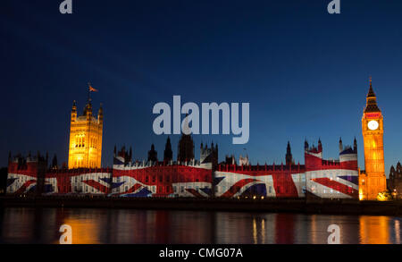 London, England, UK. Saturday, 4 August 2012. Giant images displaying British and International Olympic athletes from the past and present are projected onto the facade of the Houses of Parliament, London, for the duration of the Olympic Games and Paralympic Games 2012. Stock Photo