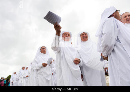 Monday 6 August 2012 Members of the Gorsedd of Bards , wearing their ceremonial robes at the National Eisteddfod of Wales. This annual cultural festival is being held this year on a disused airfield in Llandow, in the Vale of Glamorgan, on the outskirts of Cardiff photo © keith morris Stock Photo