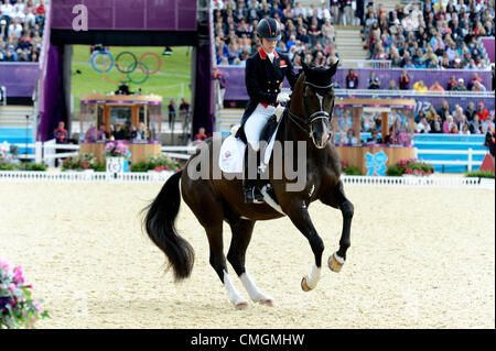 London, UK. 7th August, 2012. Greenwich Park. Olympic Equestrian Team Dressage. Gold medal winners Great Britain Charlotte Dujardin. Britains first ever Olympic Dressage medal Stock Photo