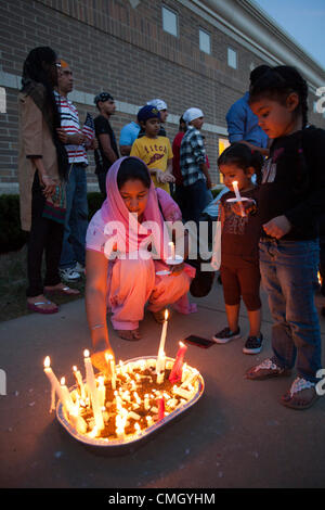 Plymouth, Michigan - Hundreds of Detroit-area Sikhs held a memorial service and candlelight vigil at the Hidden Falls Gurdwara (temple) for victims of the Wisconsin shooting. Six Sikhs were killed during a religious service at a temple near Milwaukee by Wade Michael Page, a white supremacist. Stock Photo