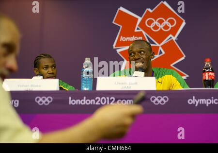 Aug. 9, 2012 - London, England, United Kingdom - Gold medal winner Jamaican sprinter USAIN BOLT participates in a press conference following his victory with teammates and silver and bronze recepients, Yohan Blake and Warren Weir, in Olympic Stadium, during the 2012 London Summer Olympics. (Credit Image: © Mark Makela/ZUMAPRESS.com) Stock Photo