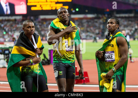 9th Aug 2012. Usain Bolt (JAM) with his gold medal for winning Men's 200m Final witn Yohan Blake (JAM) silver,(R) and Warren Weir (JAM) bronze, at the Olympic Summer Games, London 2012 Stock Photo