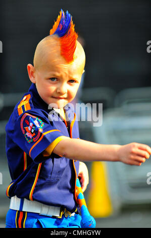 11 August 2012, Londonderry.Young bandsman with colourful spiked hair during loyalist parade. 10,000 Apprentice Boys of Derry and 120 bands took part in the annual Relief of Derry parade, the largest Loyal order parade held in Northern Ireland. Credit:  George Sweeney / Alamy Live News Stock Photo