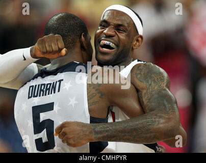 12.08.2012. London, England  Kevin Durant (L) hugs LeBron James of the United States after winning the basketball final game against Spain in North Greenwich Arena at the London 2012 Olympic Games, London, Great Britain, 12 August 2012. Stock Photo