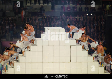 12th Aug 2012. 12.08.2012. London, England. Volunteers perform during the Closing Ceremony at the end of Day 16 of the London 2012 Olympic Games at the Olympic Stadium. Stock Photo