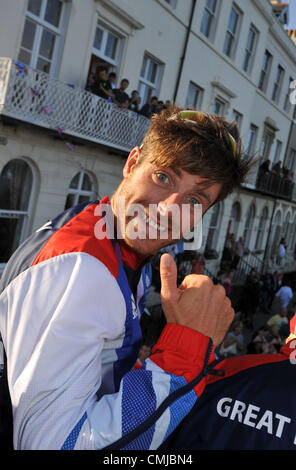 15th Aug 2012. Team GB Olympic sailors open top bus tour of Weymouth and Portland. Luke Patience.  PICTURE BY: DORSET MEDIA SERVICE Stock Photo