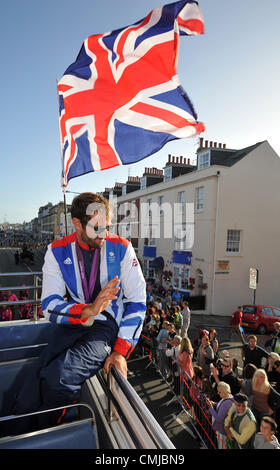 15th Aug 2012. Team GB Olympic sailors open top bus tour of Weymouth and Portland. Nick Dempsey.  PICTURE BY: DORSET MEDIA SERVICE Stock Photo