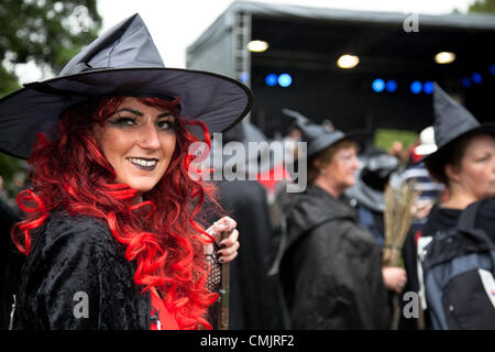 Barley, Lancashire, UK. Saturday, August 18th 2012.People gathering in the arena for the Big Witch Event Barley, in the borough of Pendle. Official Guinness World Record attempt for the largest gathering of people dressed as witches. Funds raised go to Pendleside Hospice. Stock Photo