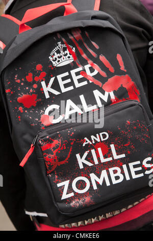 Whitby, Yorkshire, UK 2nd October, 2013. Keep Calm & Kill Zombies rucksack at UK'S Biggest Goth & Alternative Weekend. Whitby. Goths, romantics and macabre fans travelled over the moors for the Whitby Goth Weekend, which has become their spiritual home. As well as Goths, there are Punks, Steampunks, Emos, Bikers, Metallers and all manner of weird and wonderful characters, The Halloween Special was founded by Jo Hampshire in 1994, this twice-yearly event now held in Spring and late Autumn. Stock Photo
