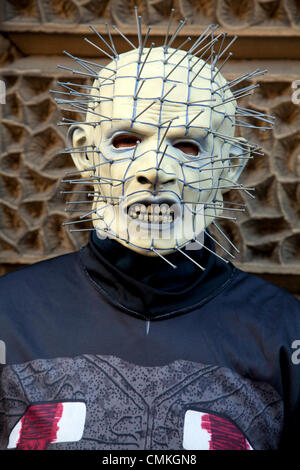 Whitby, Yorkshire, UK 2nd October, 2013. Mr Alan Naylor wearing spiky face mask at the UK'S Biggest Goth & Alternative Weekend. Whitby. Goths, romantics and macabre fans travelled over the moors for the Whitby Goth Weekend, which has become their spiritual home. As well as Goths, there are Punks, Steampunks, Emos, Bikers, Metallers and all manner of weird and wonderful characters, The Halloween Special was founded by Jo Hampshire in 1994, this twice-yearly event now held in Spring and late Autumn. Stock Photo