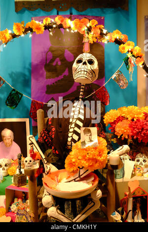 Longmont, Colorado, USA. 2nd November 2013. . Decorated Alters honoring the dead are shown as exhibits in the Longmont History Culture Center during the Dia de los Muertos celebration. The Longmont Museum hosts the largest Dia de los Muertos festival in Colorado Credit:  Ed Endicott/Alamy Live News Stock Photo