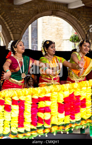 Female dancers performing a traditional Indian dance at the Diwali Festival 2nd November 2013 at the Guildhall, Cathedral Square, Peterborough, England Stock Photo