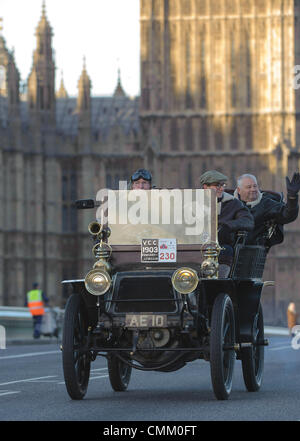 London, UK. 3rd Nov, 2013. Competitor #230 entered by Sir George White [GBR} AE 10 1903 Panhard-Levassor on Westminster Bridge, during the annual 'London to Brighton Veteran Car Run' on November 03, 2013 organised by the Royal Automobile Club. The Royal Automobile Club's 60 mile drive from the capital to the south coast is the longest running motoring event in the world, and attracts entrants from across the globe. Credit:  Action Plus Sports/Alamy Live News Stock Photo