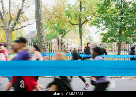 New York, USA. 03rd Nov, 2013. Runners nearing mile 12 in ING New York City Marathon November 3, 2013 © Kristin Lee/Alamy Live News Stock Photo