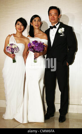 Charlie Yeung,husband Qiu Shaozhi and bridesmaid Valen Hsu pose for ...