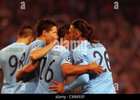 Manchester, UK. 05th Nov, 2013. DeMichaels gives Sergio Aguero of Manchester City a kiss for converting a penalty in the 3rd minute during the Champions League group D game between Manchester City and CSKA Moscow from the City of Manchester Stadium. Credit:  Action Plus Sports/Alamy Live News Stock Photo