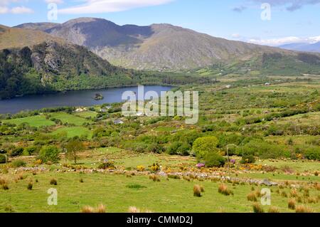 Glanmore Lake seen from the mountain road R572 which crosses the Caha Mountains at Healy Pass, photo taken May 30, 2013. The pass is at an altitude of just 300 metres, and yet the pass and the road winding downhill offer breath-taking views. Photo: Frank Baumgart Stock Photo