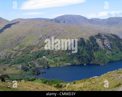 Glanmore Lake seen from the mountain road R572 which crosses the Caha Mountains at Healy Pass, photo taken May 30, 2013. The pass is at an altitude of just 300 metres, and yet the pass and the road winding downhill offer breath-taking views. Photo: Frank Baumgart Stock Photo