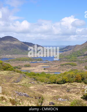 Ladies View is located between Kenmare and Killarney on the Ring of Kerry and in the heart of Killarney National Park, photo taken on May 27, 2013. The panorama of the three Lakes of Killarney and the mountains on either side was much admired by Queen Victoria’s ladies-in-waiting, when they stayed here during the royal visit in 1861, hence the name Ladies View. In 1981, the National Park was designated as a Biosphere Reserve by the UNESCO. Photo: Frank Baumgart Stock Photo