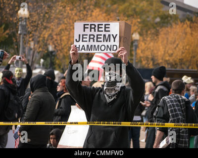 Washington, DC, USA. 05th Nov, 2013. Masked supporters of 'Anonymous' marched from the White House to the U.S. capitol on Tuesday. They are seeking more transparency and less intrusion on privacy from the government and military. Credit:  Ann Little/Alamy Live News Stock Photo