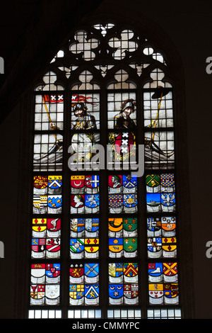 Oude Kerk (Old Church) stained glass windows showing Coats of Arms, Amsterdam, North Holland, Netherlands, Europe Stock Photo