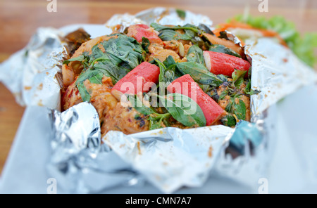 Ho Mok Thale is Thai food steamed seafood custard , curry seafood mixed herb Stock Photo