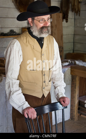 USA, Washington, Tacoma. Fort Nisqually Living History Museum; Reenactor at 1850s Hudson's Bay fort. (MR) Stock Photo