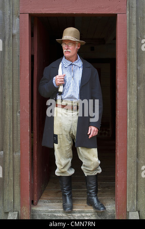 USA, Washington, Tacoma. Fort Nisqually Living History Museum; Reenactor at 1850s Hudson's Bay fort. (MR) Stock Photo