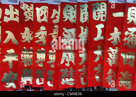 good luck messages during Chinese New Year at Wat Mangkon Kamalawat in Bangkok's Chinatown Stock Photo