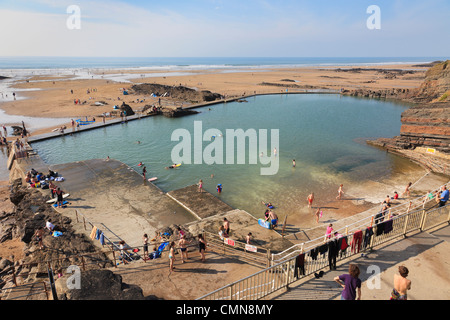 Summerleaze Beach tidal sea pool for safe swimming with holidaymakers in Bude, Cornwall, England, UK, Britain. Stock Photo