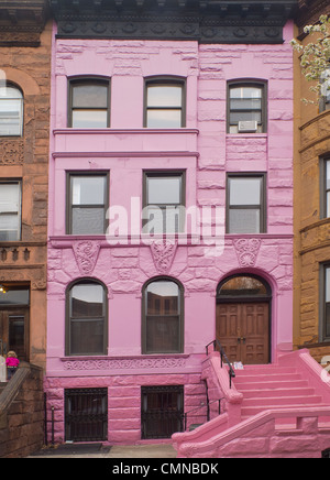 painted pink brownstone in Brooklyn NYC Stock Photo