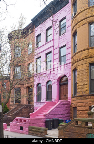 painted pink brownstone in Brooklyn NYC Stock Photo