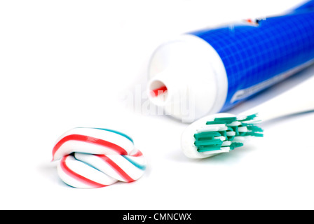 white red and blue squeezed toothpaste isolated on a white background ...