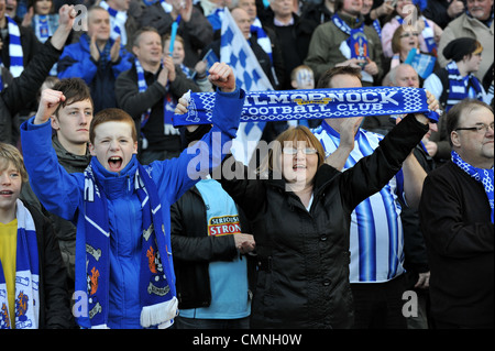 Kilmarnock fans celebrate victory over Celtic in the Scottish Communities League Cup final at Hampden. Stock Photo