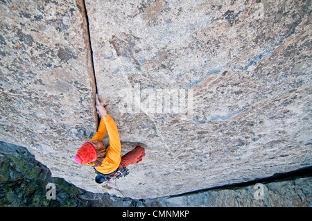 Nic Houser rock climbing a route called Bloody Fingers on Super Hits Wall at the City Of Rocks National Reserve in Idaho Stock Photo