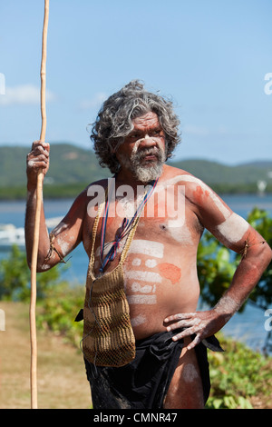 Indigenous men from Guugu Yimithirr tribe during re-enactment of Captain Cook's landing, Cooktown, Queensland, Australia Stock Photo