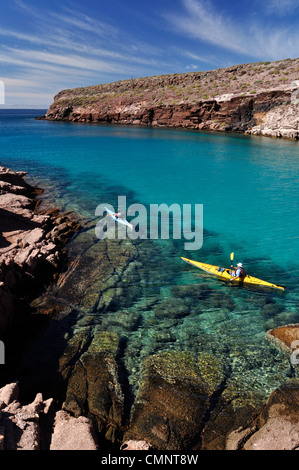Sea kayaking along Espiritu Santo Island in the Sea of Cortez, Baja California, Mexico. Stock Photo