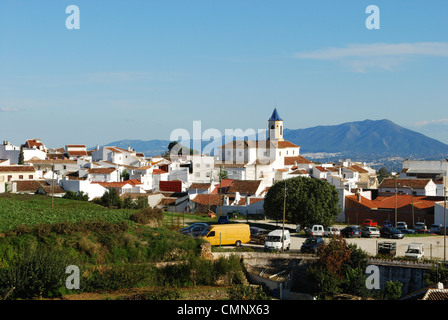 Incarnation Church (built in 1505) and townhouses, whitewashed village (pueblo blanco), Yunquera, Andalucia, Spain, Western Euro Stock Photo