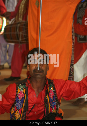 Sindhi man performs a traditional Pakistani dance at the first Dawn Pakistan Agri Expo in Karachi, Pakistan. Stock Photo