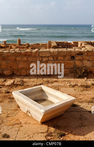 Apollonia. Libya. View at the Central church or Basilica of white marble basin used for baptising small children. Located Stock Photo