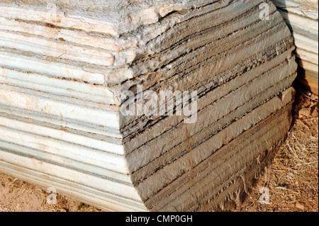 Apollonia. Libya. Close-up view of one of the large monolithic columns of cipollino marble of the Eastern Church. Dating from Stock Photo