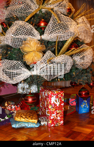 Detail of Christmas tree with decorations, presents and cards Stock Photo