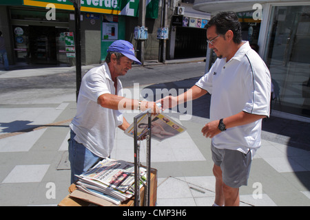 Arica Chile,Paseo Peatonal 21 de Mayo,street scene,newspaper,vendor vendors stall stalls booth market marketplace,paperboy,Hispanic man men male adult Stock Photo
