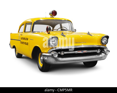 License available at MaximImages.com - 1957 Chevrolet 150 Metropolitan Toronto Police yellow classic retro car isolated on white background Stock Photo