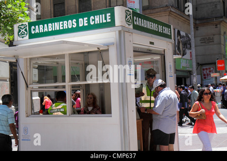 Santiago Chile,Paseo Ahumada,street scene,Carabiniers,Carabineros de Chile,national police,law enforcement,public safety,kiosk,Hispanic man men male,w Stock Photo